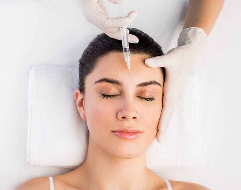 woman getting dysport in between her eyebrows in Ashburn, VA