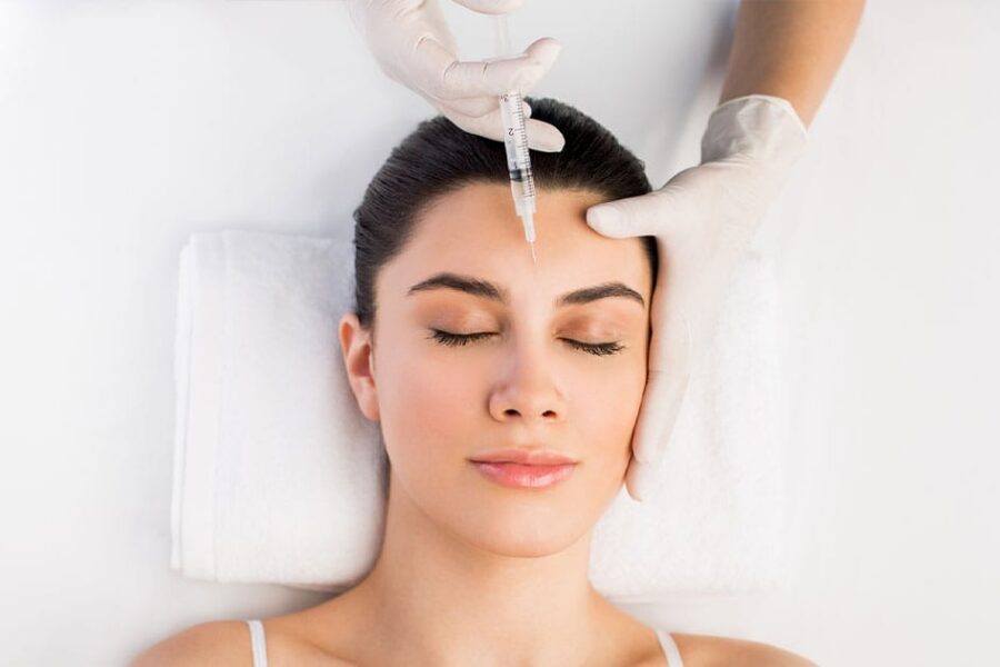 woman getting dysport in between her eyebrows in Ashburn, VA