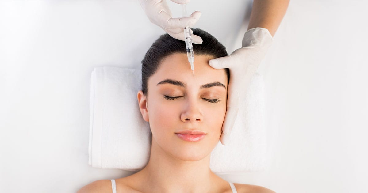 woman getting dysport in between her eyebrows in Ashburn, VA