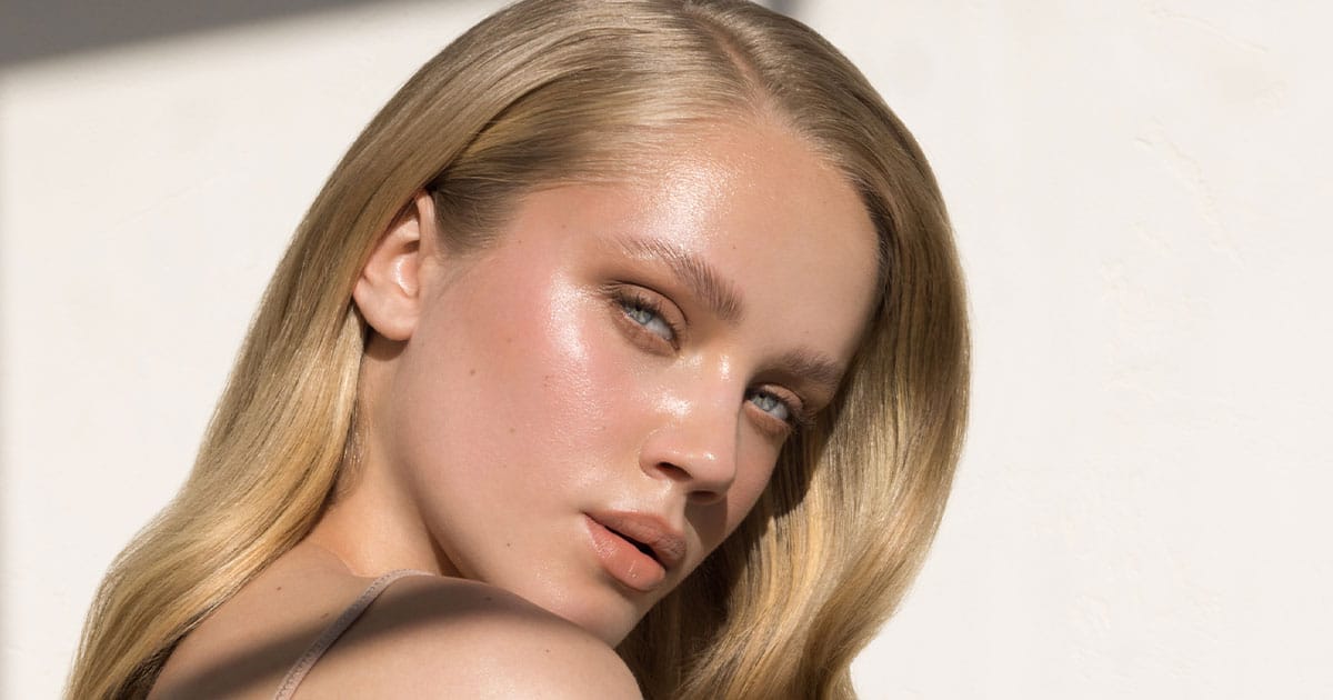 woman with glowing skin after getting a hydrafacial in Ashburn, VA