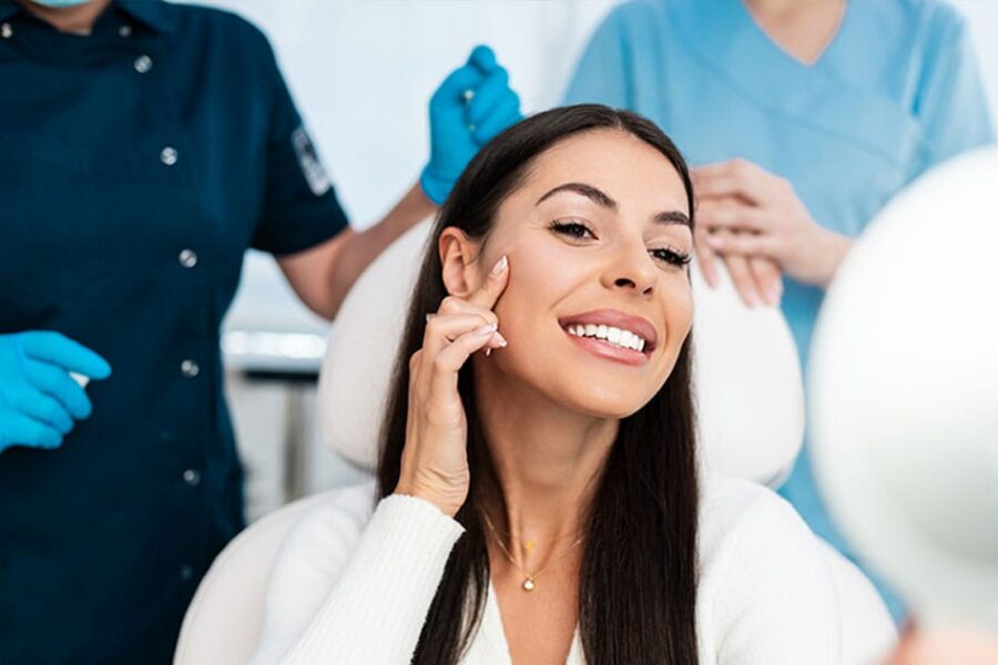 woman smiling after getting botox in Ashburn, VA