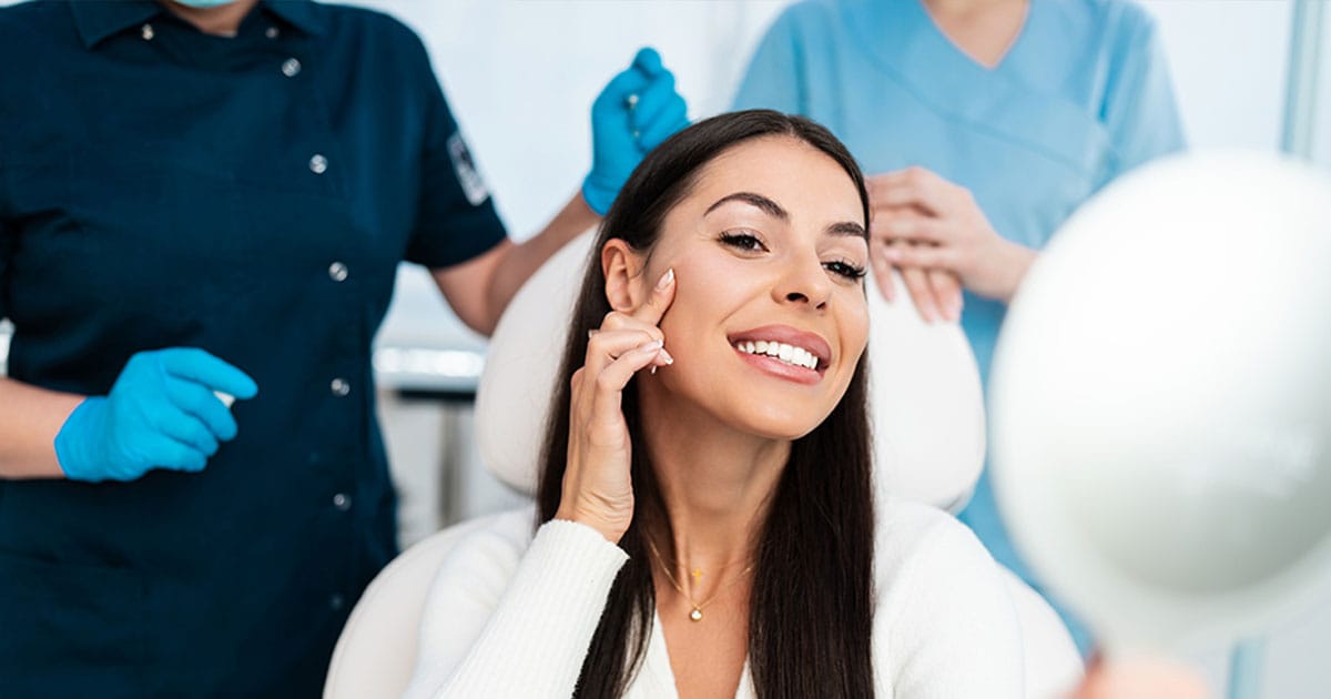 woman smiling after getting botox in Ashburn, VA